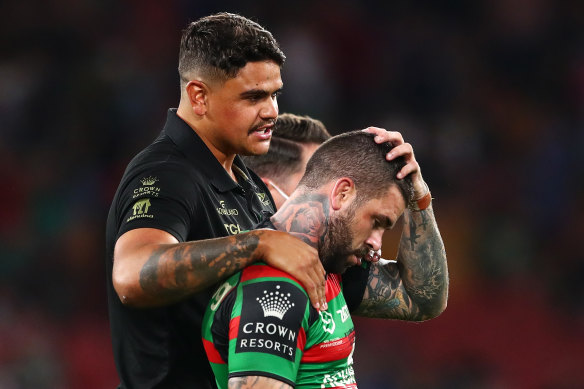 Latrell Mitchell comforts Adam Reynolds after the 2021 grand final loss to Penrith.