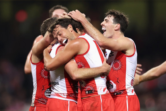 Sydney players are all smiles after producing a dominant display.