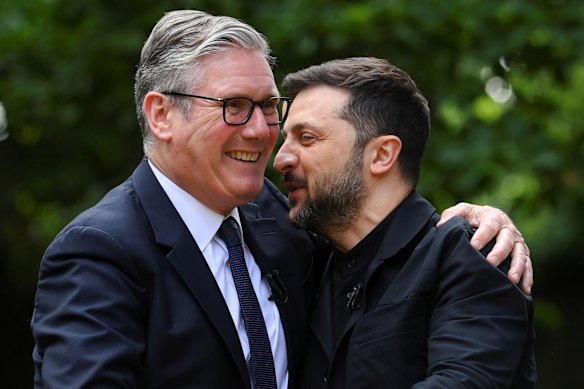 British Prime Minister Keir Starmer embraces Ukrainian President Volodymyr Zelensky at 10 Downing Street.
