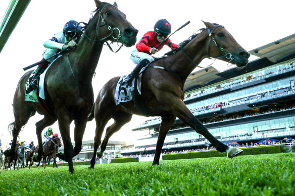 Rachel King on Just Fine holds off Spirit Ridge in the Metropolitan at Randwick.