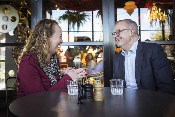 Prime Minister Anthony Albanese congratulates the newly elected member for Aston, Mary Doyle, at a Bayswater cafe.