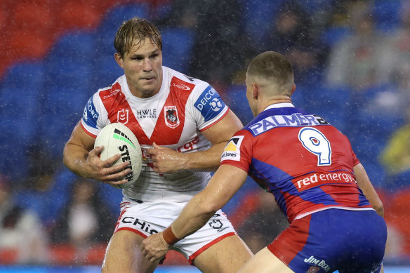 Jack de Belin on the charge for the Dragons.