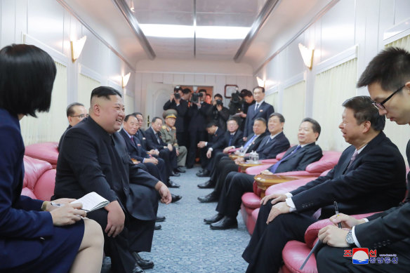 North Korean leader Kim Jong-un on his special train with China’s International Department head, Song Tao, in 2019.