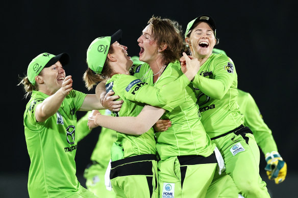 Thunder players celebrate their semi-final victory.