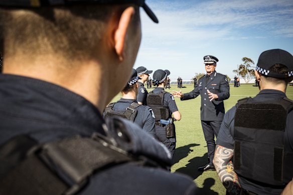 Chief Commissioner Mike Bush speaks to recruits at the Police Academy in May.