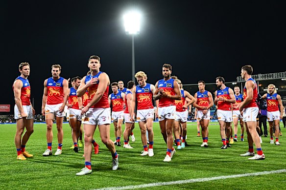 Brisbane Lions players trudge of Ninja Stadium with two points more to their season tally.