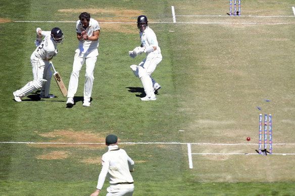 A moment in time: Kane Williamson is dramatically run out.