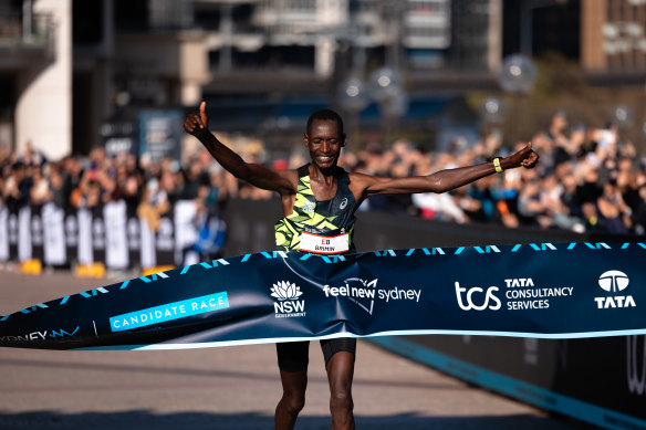 Kenyan winner Brimin Misoi crossing the line.