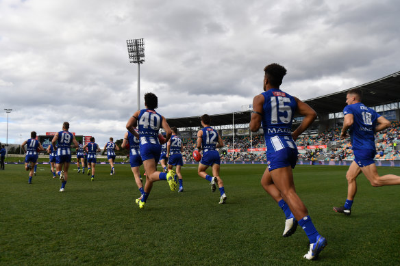 The Kangaroos take to the field in Hobart two weeks ago.