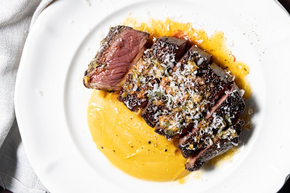 Steak with pureed fava beans. 