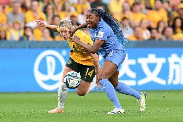 Kadidiatou Diani of France and Alanna Kennedy of Australia compete for the ball.