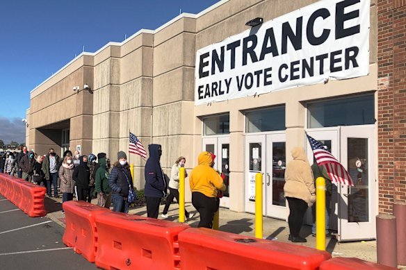 People line up to cast early votes in Columbus, Ohio. 