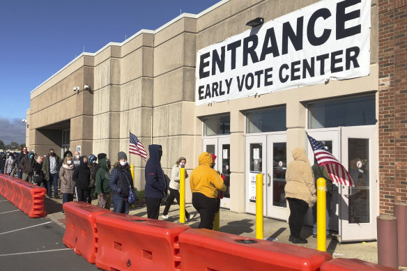 People line up to cast early votes in Columbus, Ohio. 