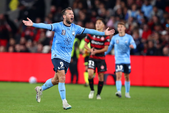 Adam La Fondre celebrates victory.