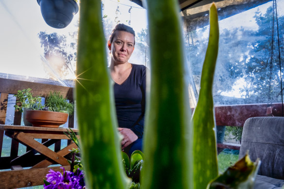 Rachel Durrant  in her garden in Craigieburn. She has grown succulents from cuttings she bought online.