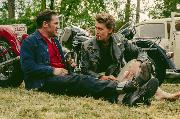 Tom Hardy (left) and Austin Butler are members of the Vandals motorcycle club in The Bikeriders.