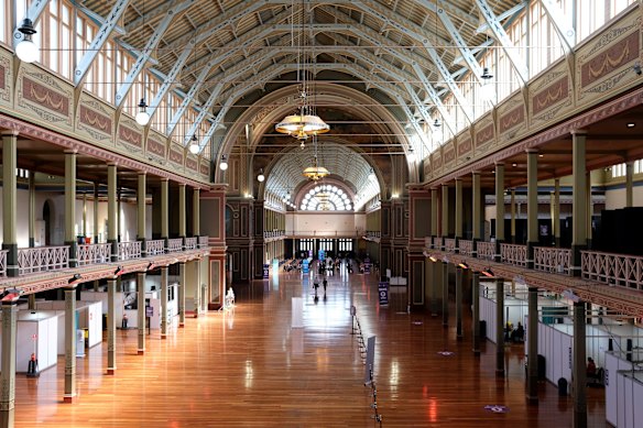 People attend the mass vaccination hub at the Royal Exhibition Building.