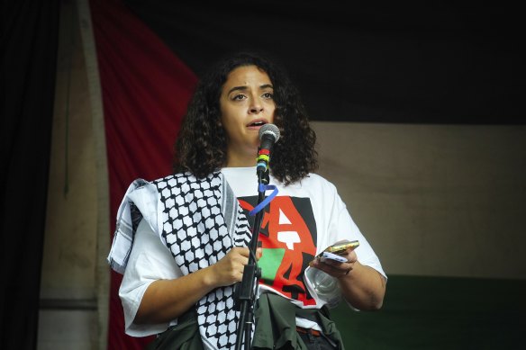 Nour Salman speaks to the crowd during a Pro-Palestinian rally in Melbourne on Sunday.