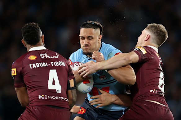 Keaon Koloamatangi takes on the defence during his lone Origin appearance, in 2023.