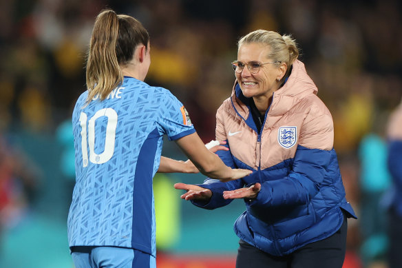 Sarina Wiegman celebrates with England’s first goalscorer Ella Toone.