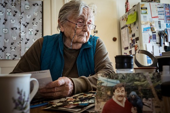 Doris LeRoy with photos of her son, Terry, who died in the stroke unit of Sunshine Hospital amid a funding dispute between the hospital and the NDIS.