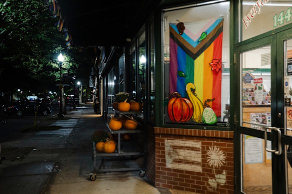 A Pride flag at a grocery story across the street from Last Ditch.