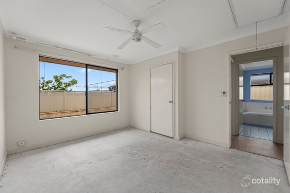 A bedroom in Jason Forbes’ former house shows attic access, a key locked door and a sensor. It was the only room in the house stripped of its flooring and window coverings before it was sold under proceeds of crime. 