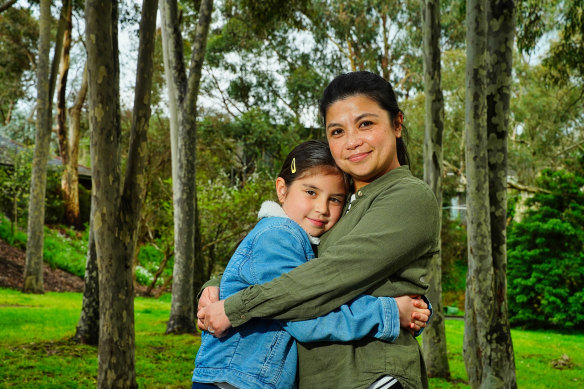 Mila Zakanj, 8, with her mother Joi Zakanj.