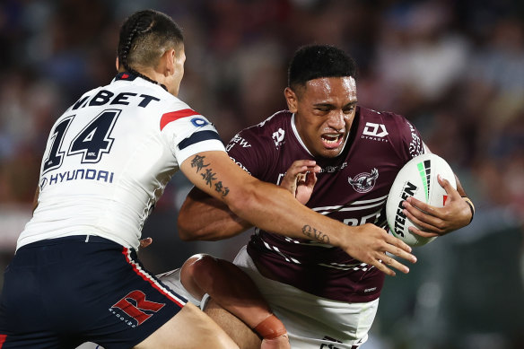 Viliami Fifita is at the centre of a tug of war.