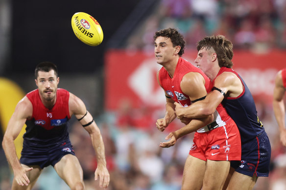 Sam Wicks is tackled during the Swans’ first game of the season against Melbourne.