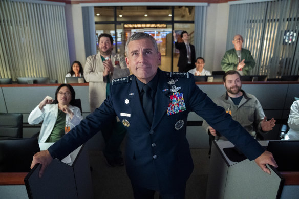 Steve Carell, centre, was earning $US1 million per episode for the just-cancelled Space Force. 