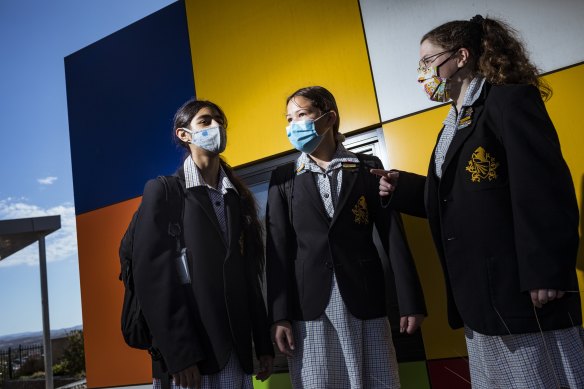 Bacchus Marsh Grammar grade six students Jazmine, Mikayla and Charotte return to school after lockdown six ended overnight.