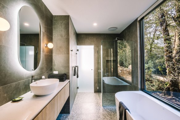 There’s no roughing it with this bathroom, complete with view.