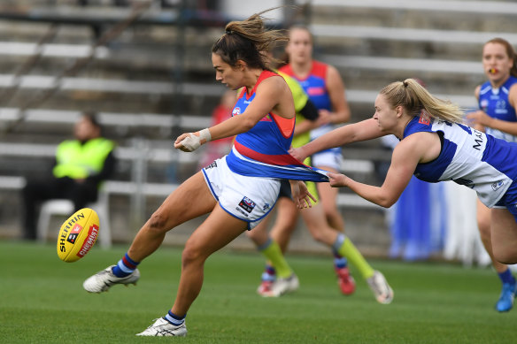 Elisabeth Georgostathis of the Bulldogs gets a kick away but the day belonged to the Kangaroos.