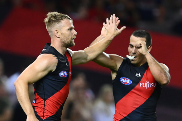 Jake Stringer is congratulated by Alec Waterman after scoring for the Bombers.