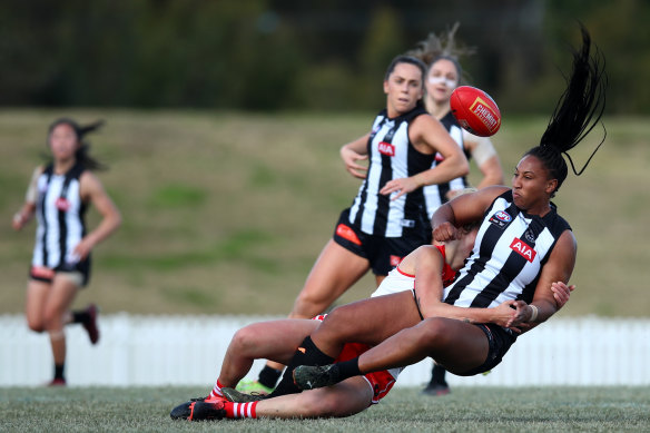 Magpie Sabrina Frederick is tackled by Sydney’s Cynthia Hamilton.