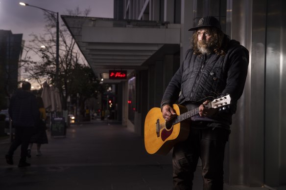 Chris Mineral has been busking on Spring Street for years, He continued playing during each lockdown - even though there was often no one to hear him.