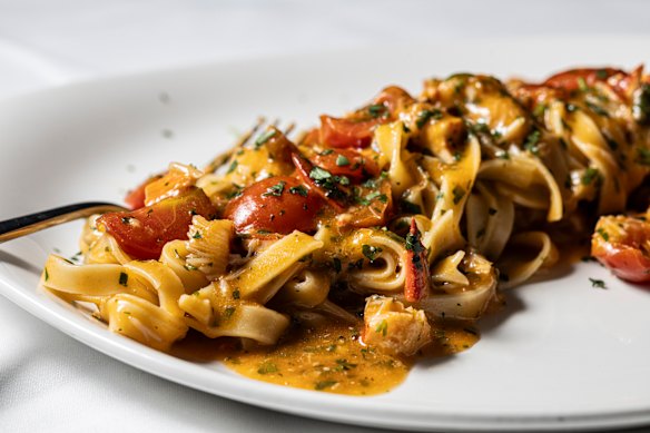 Fettuccine all’aragosta with lobster meat tossed in its bisque, cherry tomatoes and chilli.