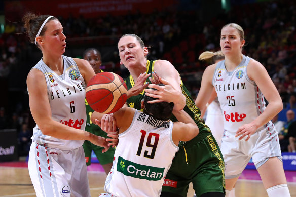Jackson assists an opposition player mid-collision during the Opals’ win over Belgium.