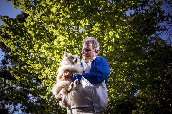 John Chellew, the director of Bayside School Refusal Clinic, and his therapy dog Max.