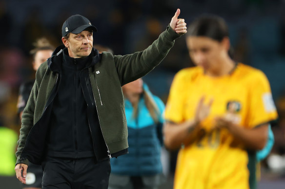 Matildas coach Tony Gustavsson applauds fans after the team’s 1-3 defeat to England.