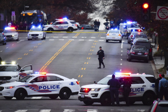 The scene in Washington DC after a man who said he was investigating a conspiracy theory about Hillary Clinton running a child sex ring out of a pizza place fired an assault rifle inside the restaurant.