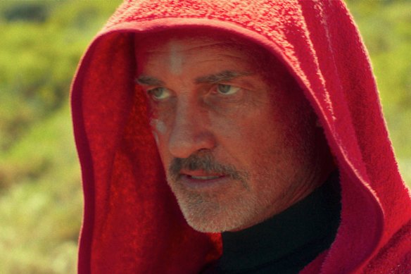 The late Julian McMahon in a scene from The Surfer.