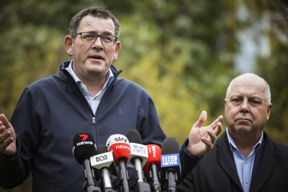 Premier Daniel Andrews and Treasurer Tim Pallas announcing the $380 million compensation deal to cancel the Commonwealth Games.