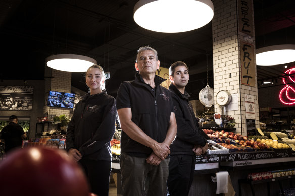 South Yarra specialty food store owner Greg LaManna, with daughter Kayla and son Brandon, says the cost of doing business in Melbourne has risen sharply.