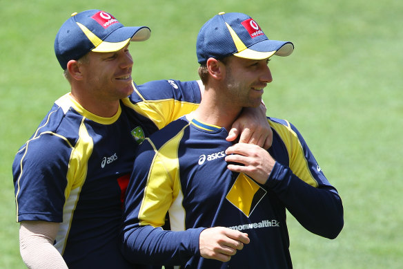 David Warner and Phillip Hughes during an Australian training session at the Gabba in 2011.