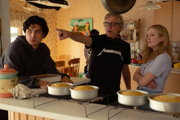 Director Todd Haynes, centre, on set with Charles Melton and Julianne Moore.