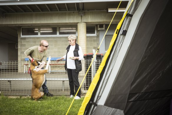 Mooroopna residents Casey Petersen and his mother Jan came to the Evacuation Centre at the Tatura Football Oval after floodwaters rose quickly at her home. 