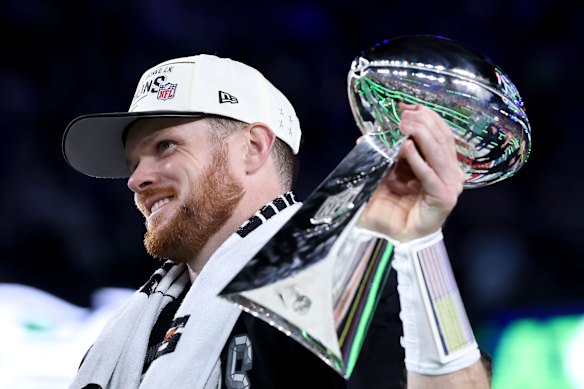 Sam Darnold of the Seattle Seahawks celebrates with the Vince Lombardi Trophy.