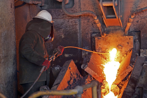 BHP's Olympic Dam mine workers are having their temperatures taken.